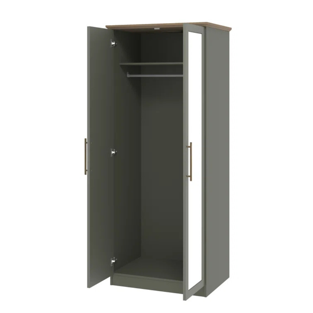 Sage green wardrobe with open doors on a white background