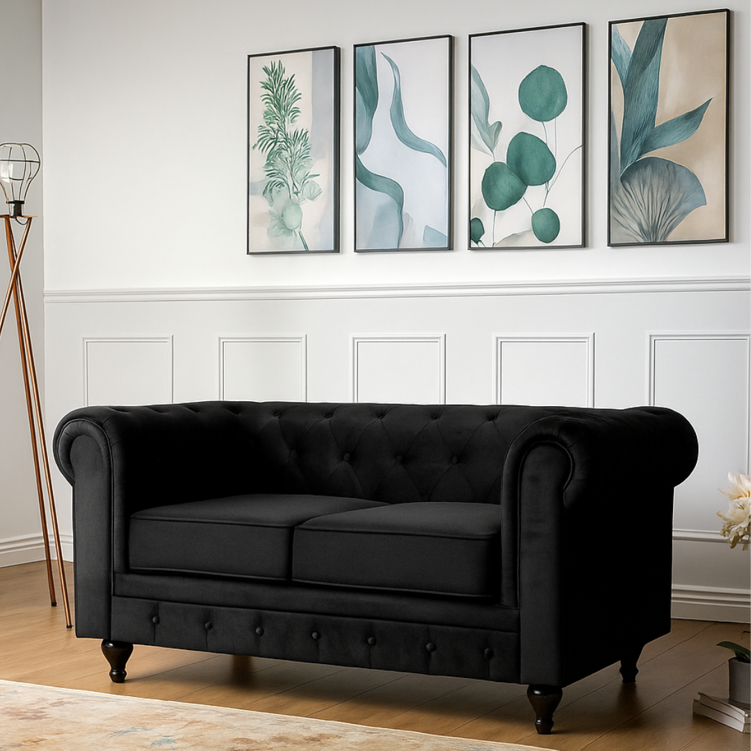 2-Seater Black Velvet Chesterfield Settee, set in a modern home.