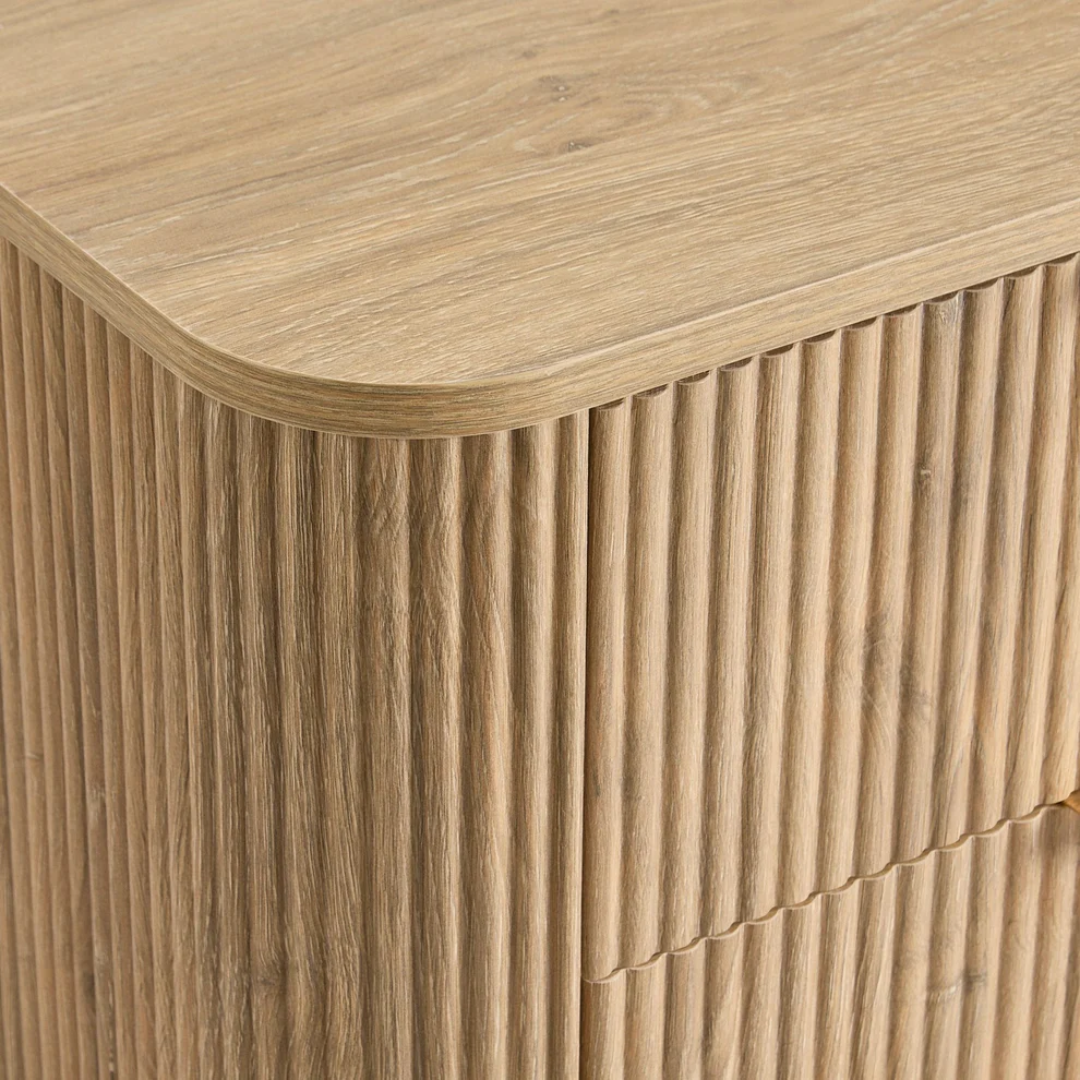 Wooden side table with a ribbed texture and light brown finish
