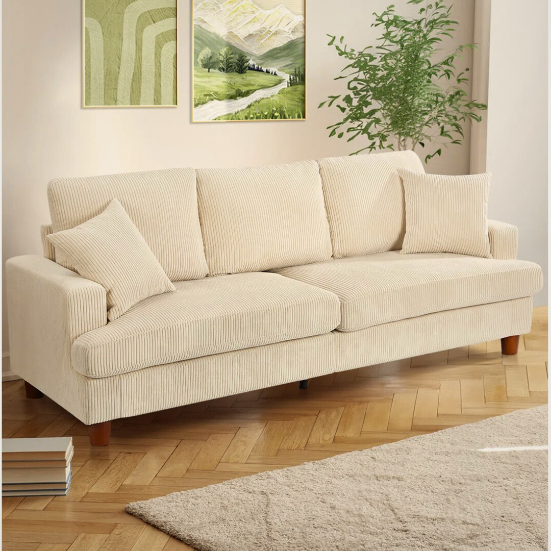 3-Seater Beige Corduroy Fabric Sofa, set in a model home.