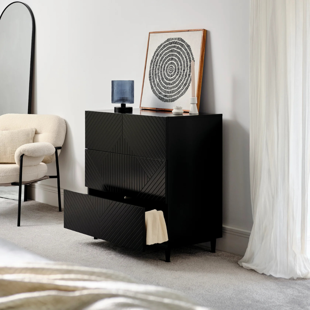 3 Geometric Black Bedroom Drawers, angled view in a modern home.