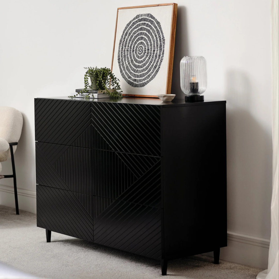 6 Geometric Black Bedroom Drawers, angled view, in a model modern home.