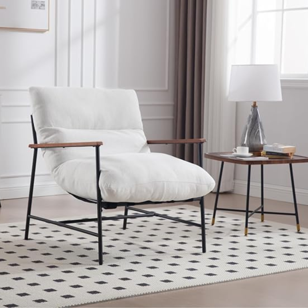 accent chair with metal frame and deep cushioned seat, white chair in a modern living corner.