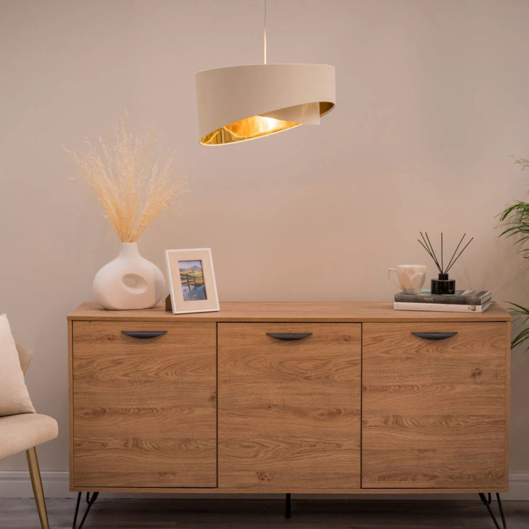 Wooden sideboard with decorative items in a room setting