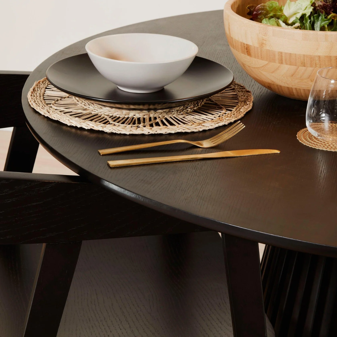 Black Dining Room Chairs With Arms close up of the solid black wood