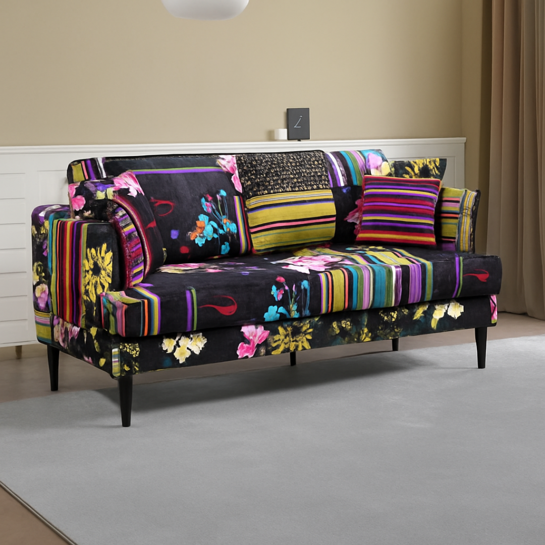 Black Multi Coloured Three Seater Patchwork Sofa, set in a model home.