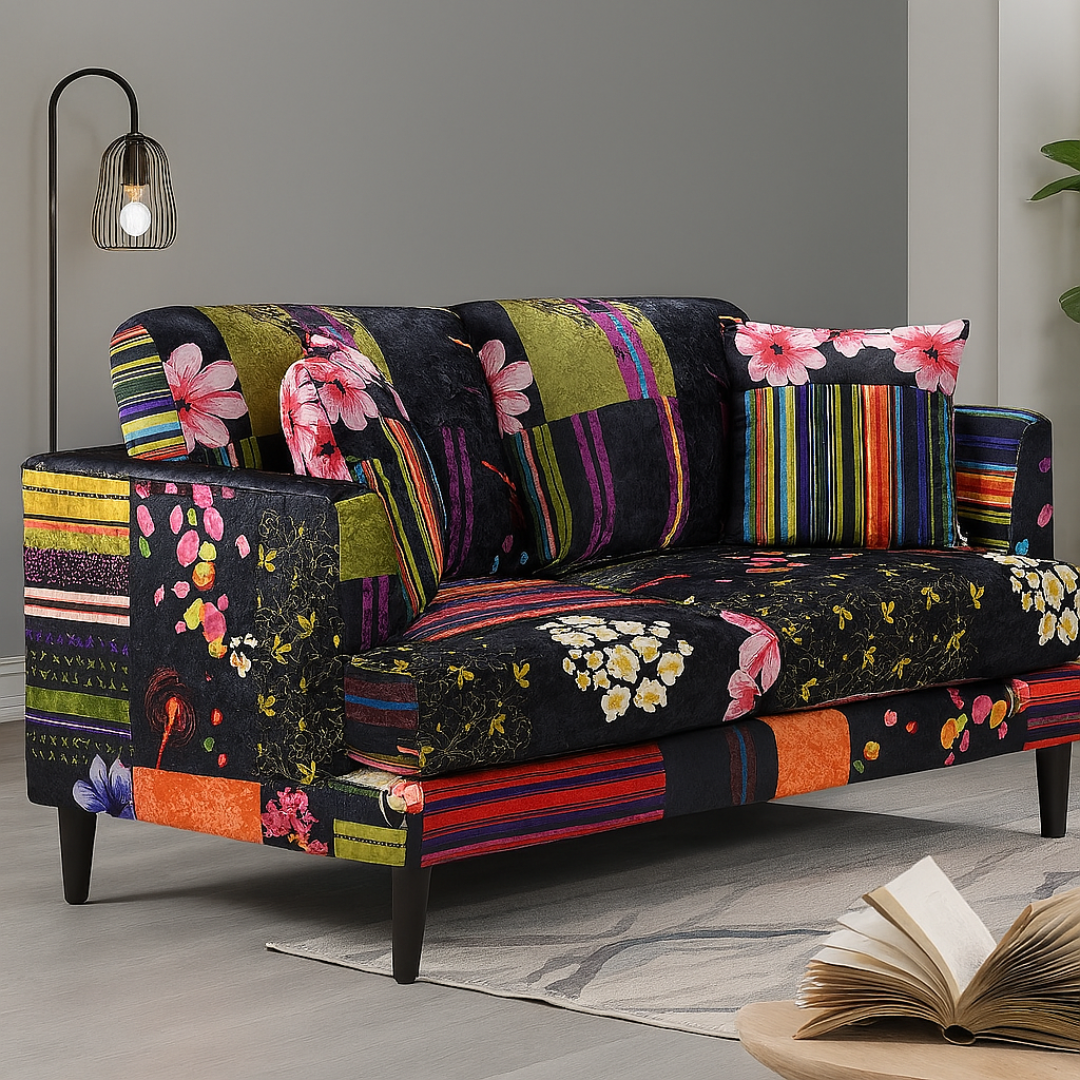 Black Multi Coloured Two Seater Patchwork Sofa, set in a modern home.
