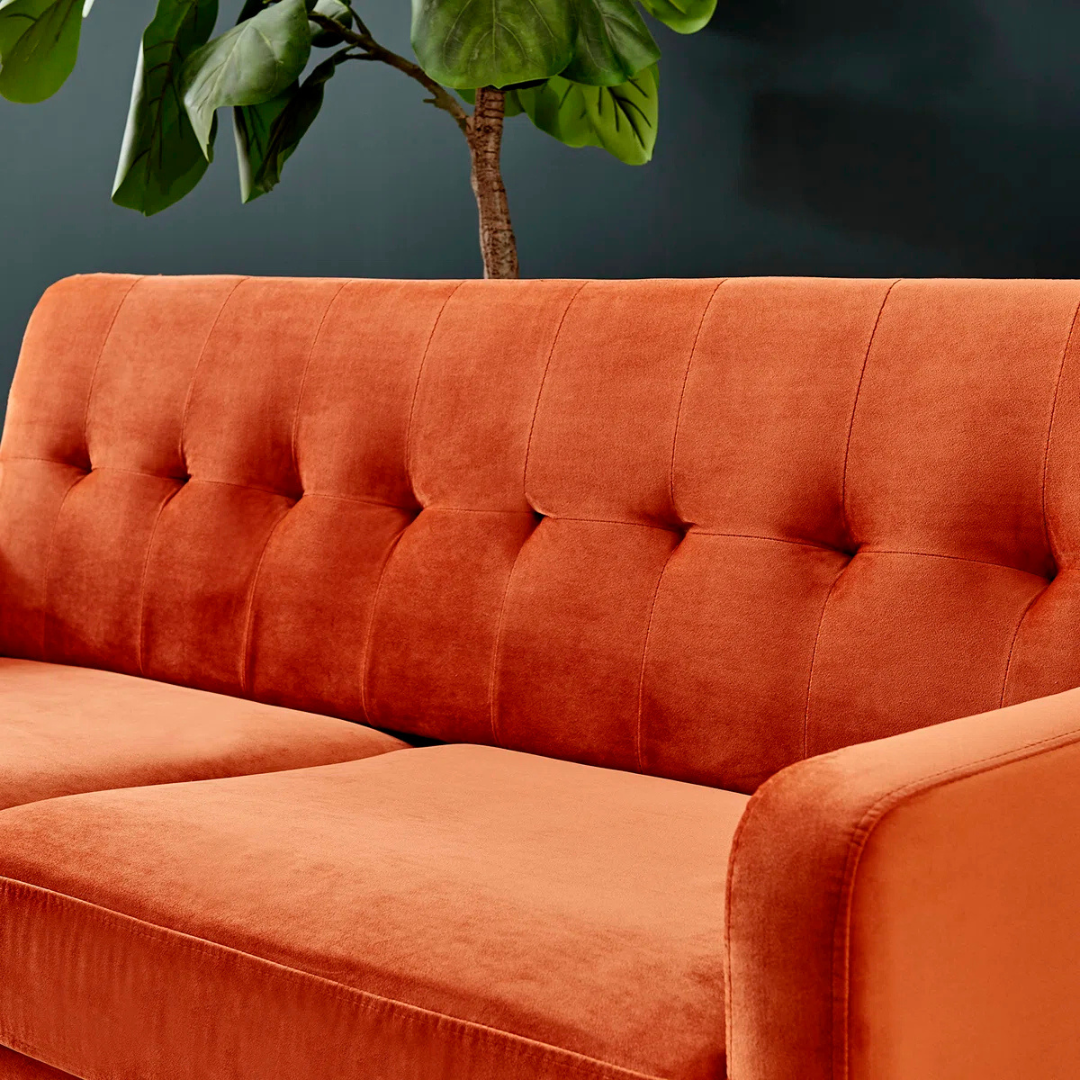 Contemporary 3-Seater Burnt Orange Sofa, set in a modern home, close up of sofas design.