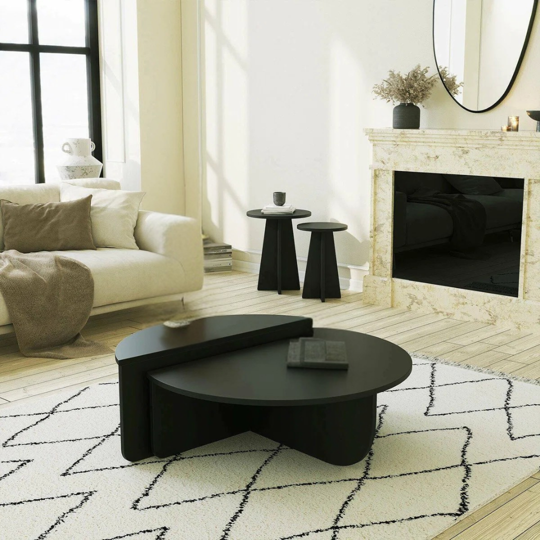 Contemporary low round coffee table with magazine slot, black table set in a modern home.