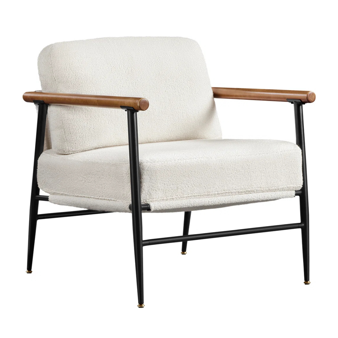 modern white boucle accent chair with wood arms and metal frame, white background, angled view.