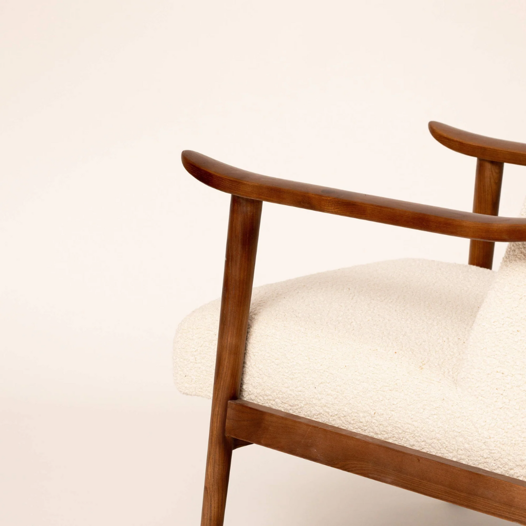 Dark Wood Boucle Modern Mid Century Armchair close up of the dark wood frame