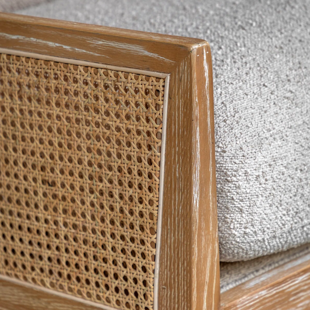 Close-up of a wooden frame with woven pattern and textured fabric background