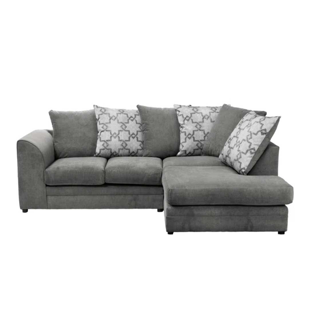 Grey Modern Corner Sofa With Pillows, white background, front view.