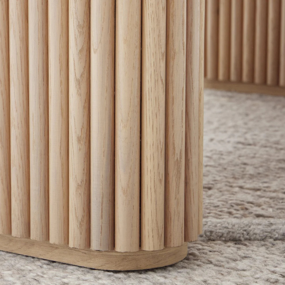 Japandi Wooden Oval Dining Table, close up to slated base.