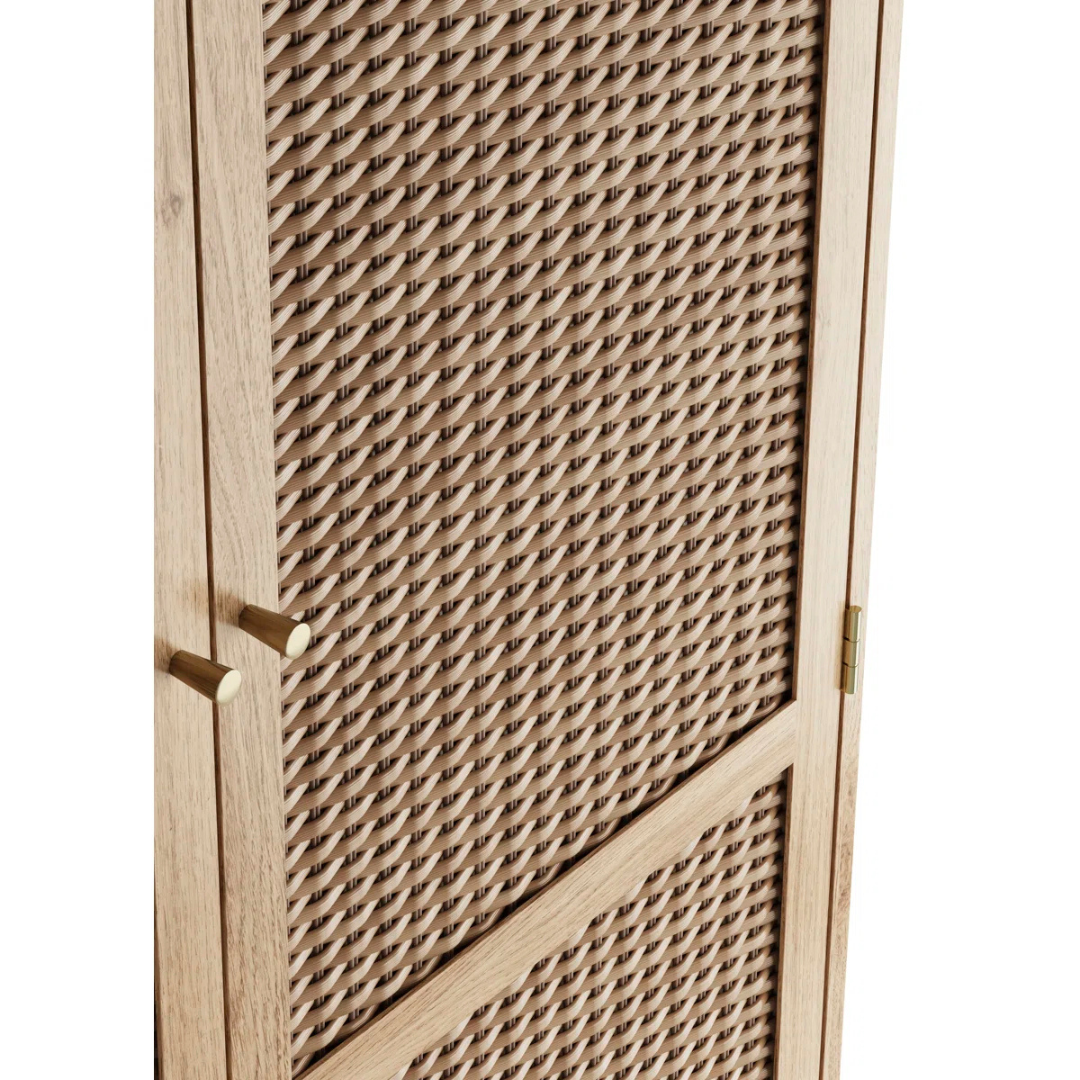 Wooden cabinet with wicker door on a white background