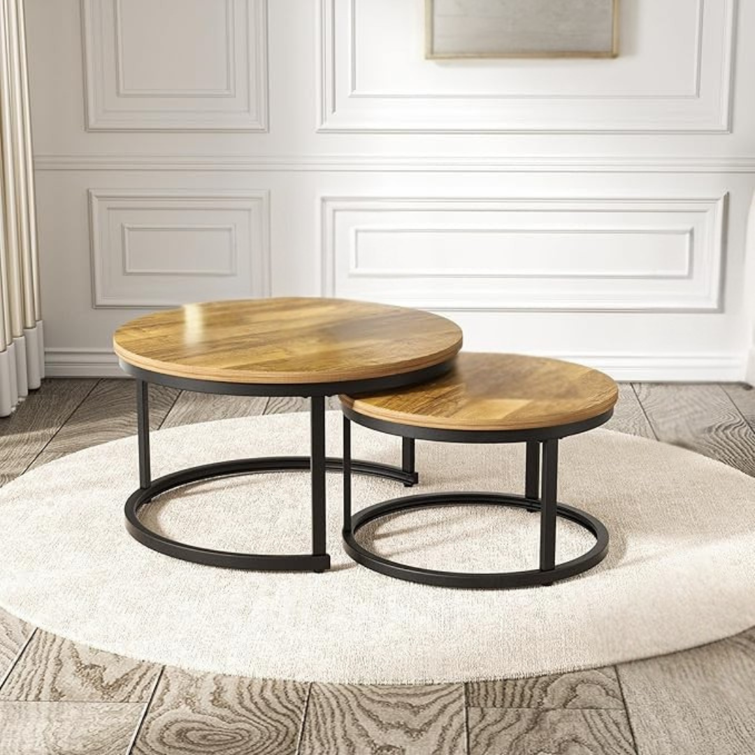 Modern round nesting coffee tables in a living room setting, wood.