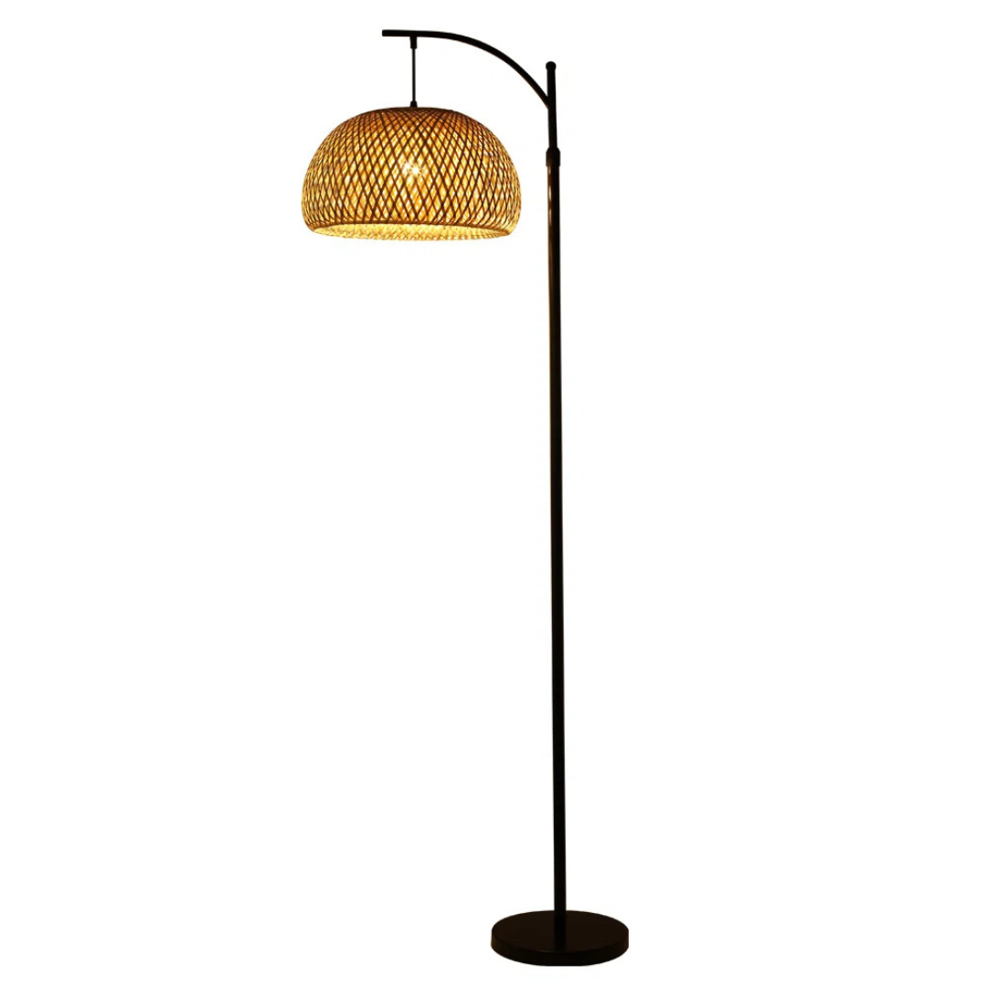 Floor lamp with wicker shade on a white background