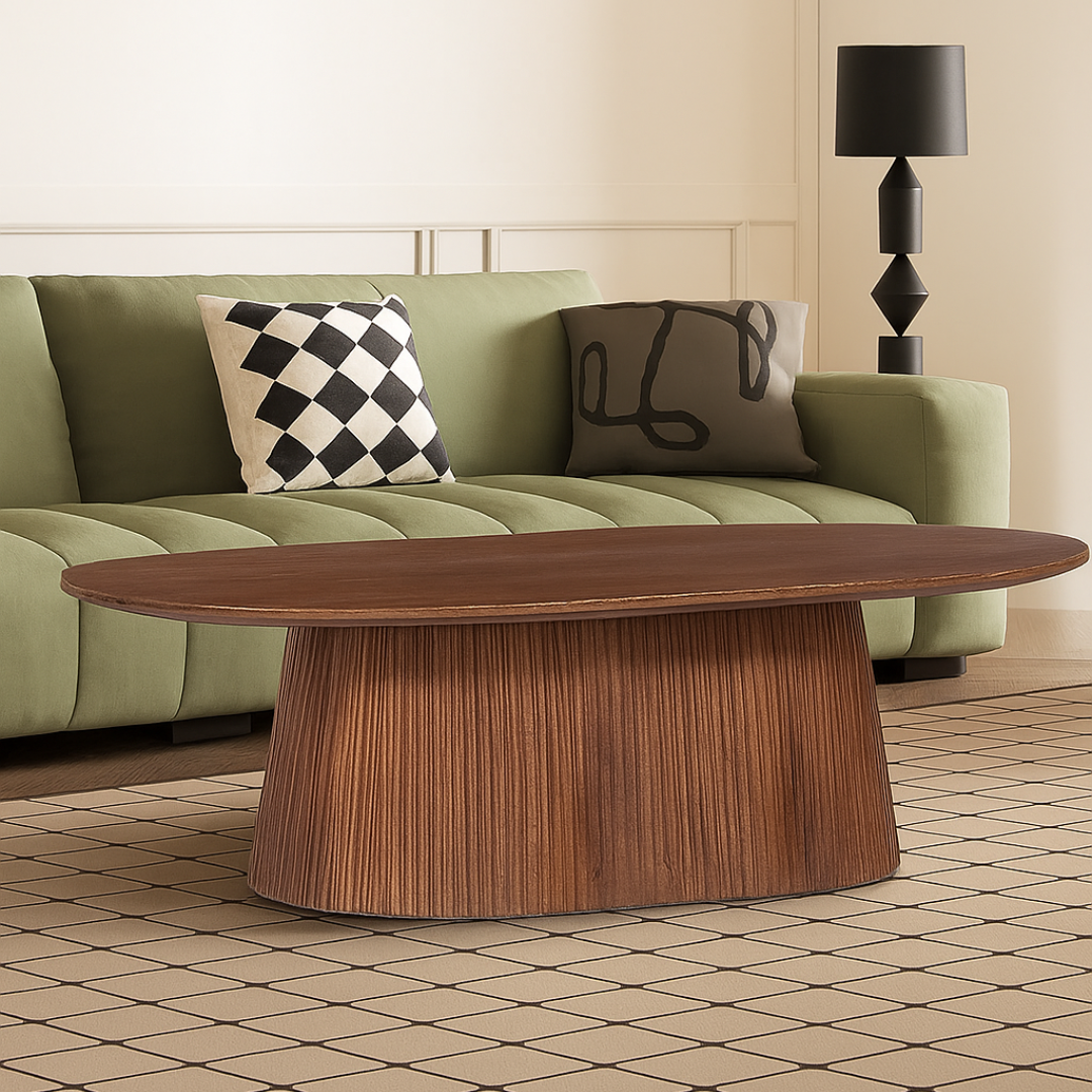 Green sofa with decorative pillows and a wooden coffee table in a living room setting.