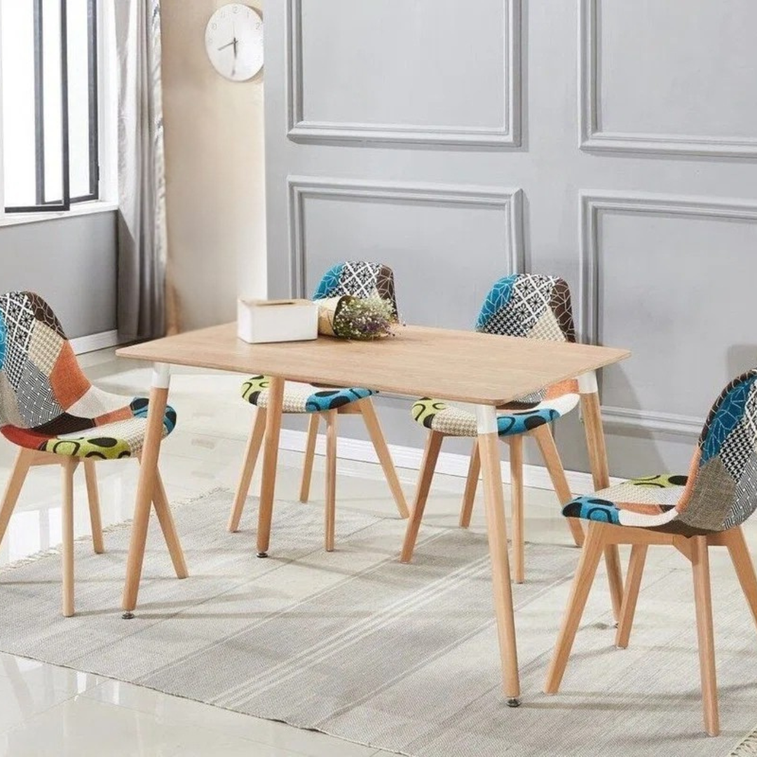 Patchwork Funky Colourful Dining Chairs Set Of 4, set around a modern dining table.