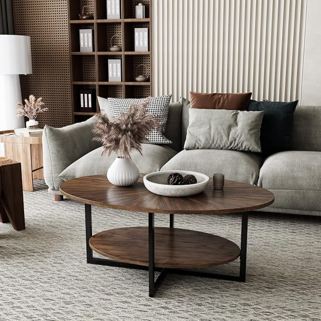 Rustic brown oval coffee table with lower shelf, set up in a rustic modern home.