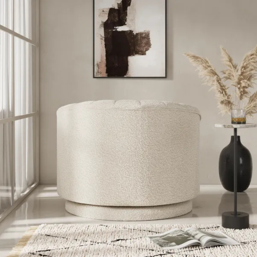 scalloped bouclé swivel chair with fluted backrest design, in a modern living room, back view.