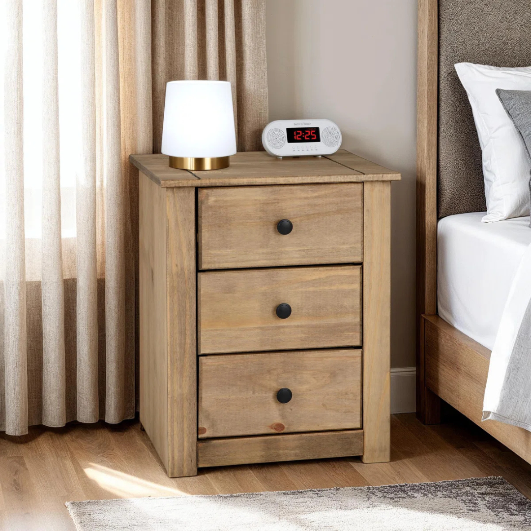 Solid Wood Bedside 3 Drawer Cabinet, set in a model home.
