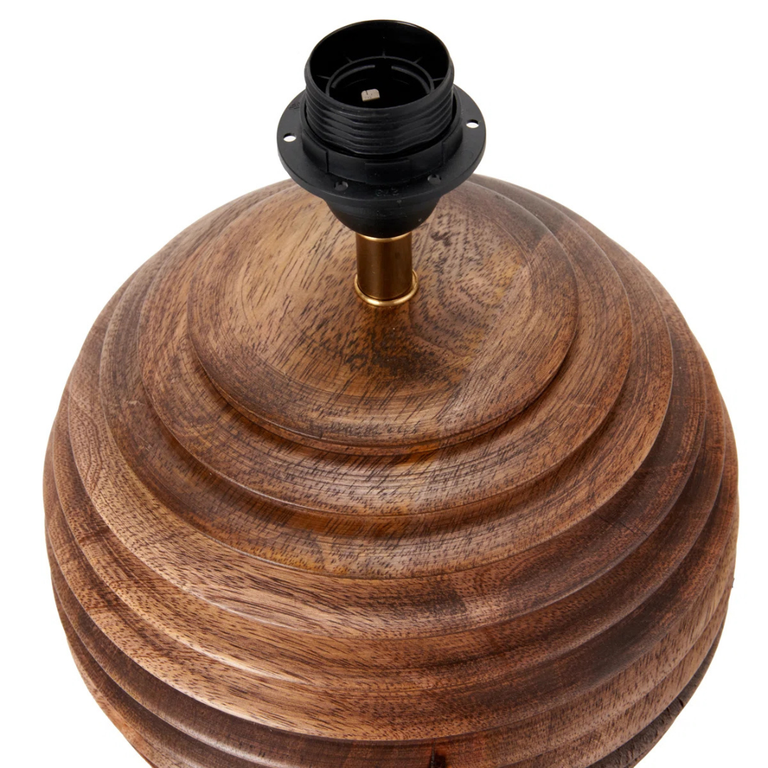 Wooden lamp base with black socket on a white background