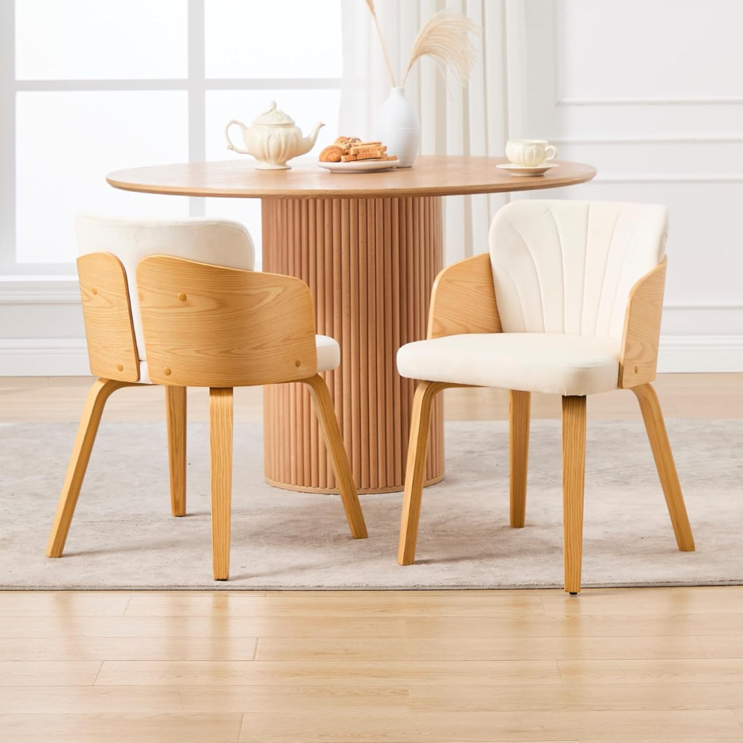Solid Wood Danish Modern Dining Chair styled in a modern dining room with a stylish table