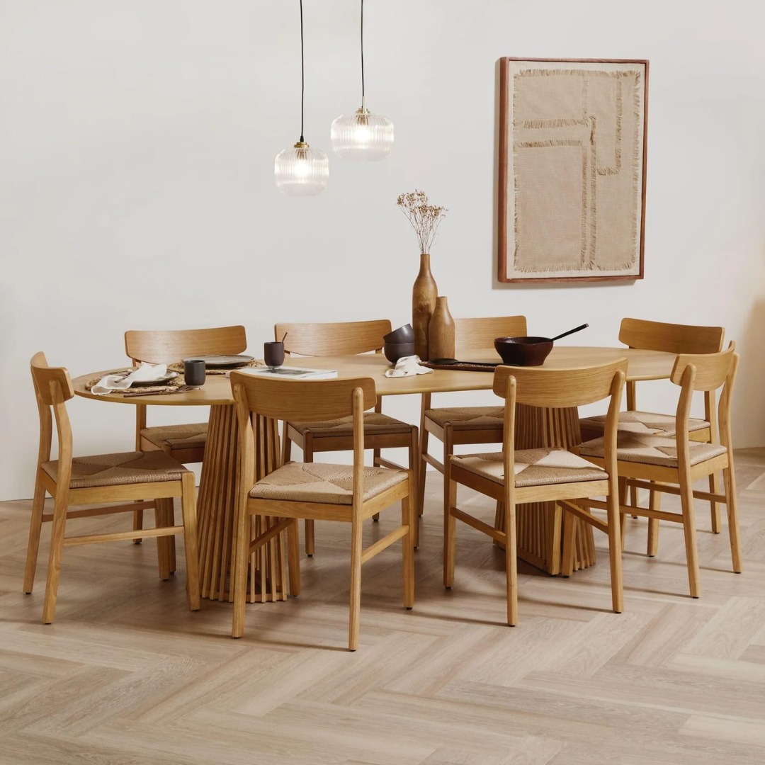Solid Wood Woven Chairs Dining styled around a wood dining table in a modern style interior