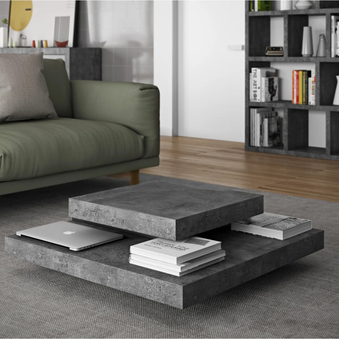 Stone design dark grey coffee table with layered surface, set in a modern home.