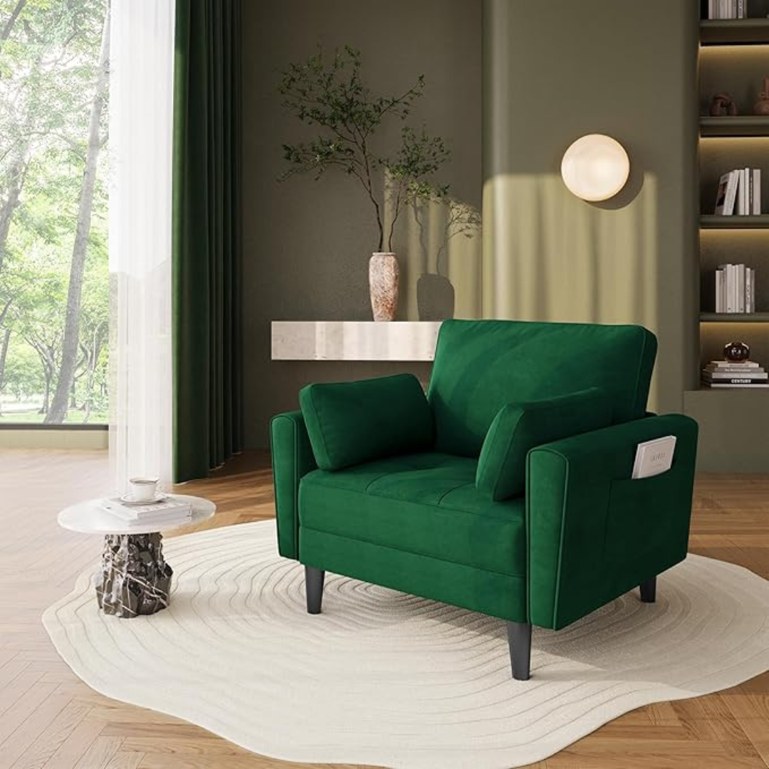 velvet emerald green armchair with matching cushions in a modern living room.