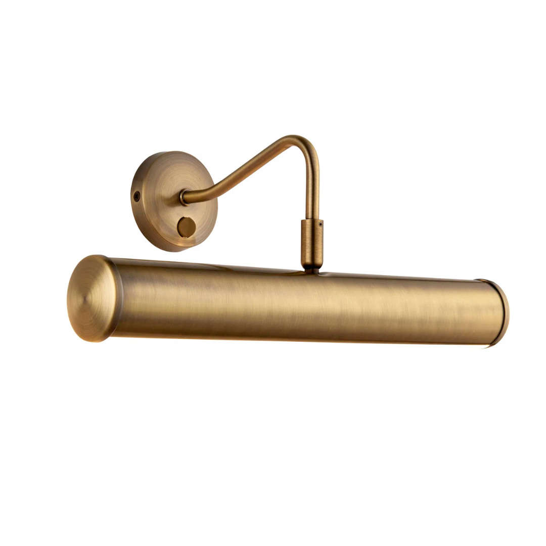 Brass wall-mounted lamp on a white background