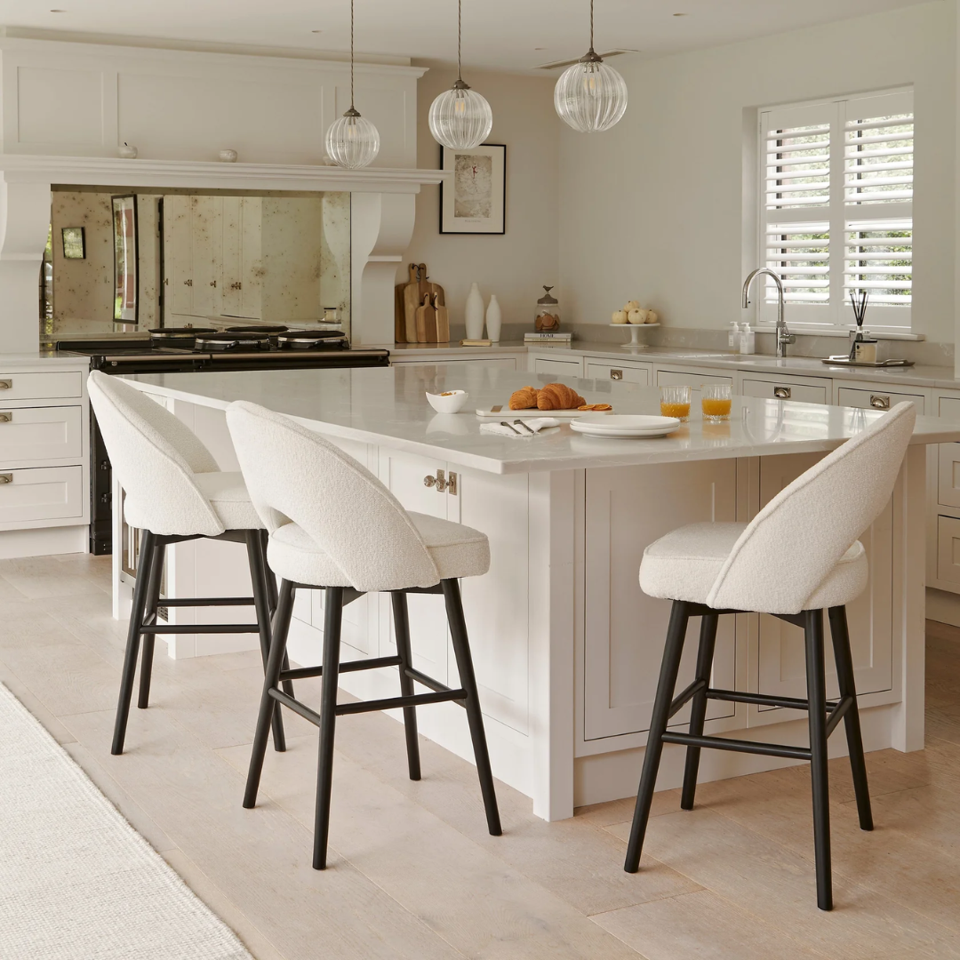 White Boucle Bar Stool Black Legs styled around a modern kitchen island