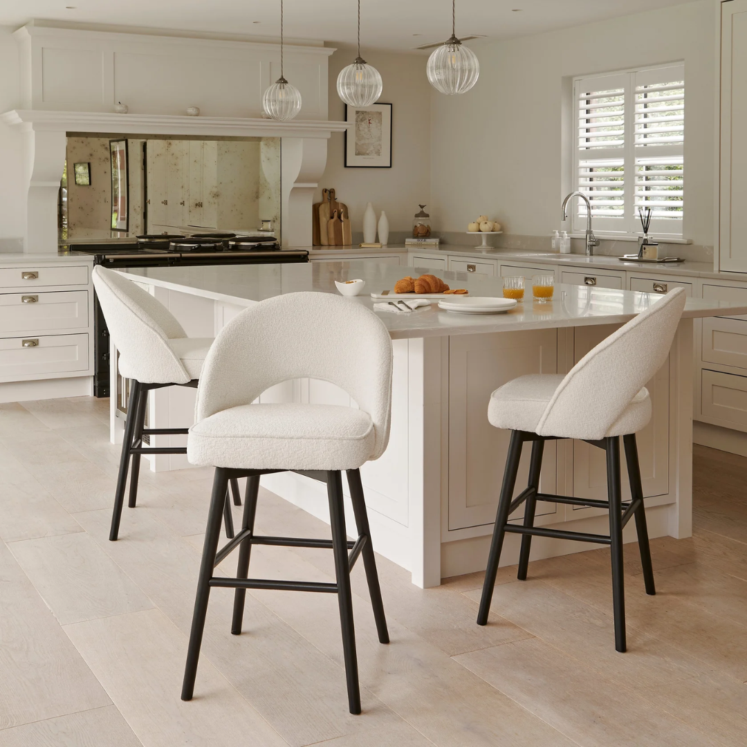 White Boucle Bar Stool Black Legs styled in a modern kitchen around a kitchen island set of 4