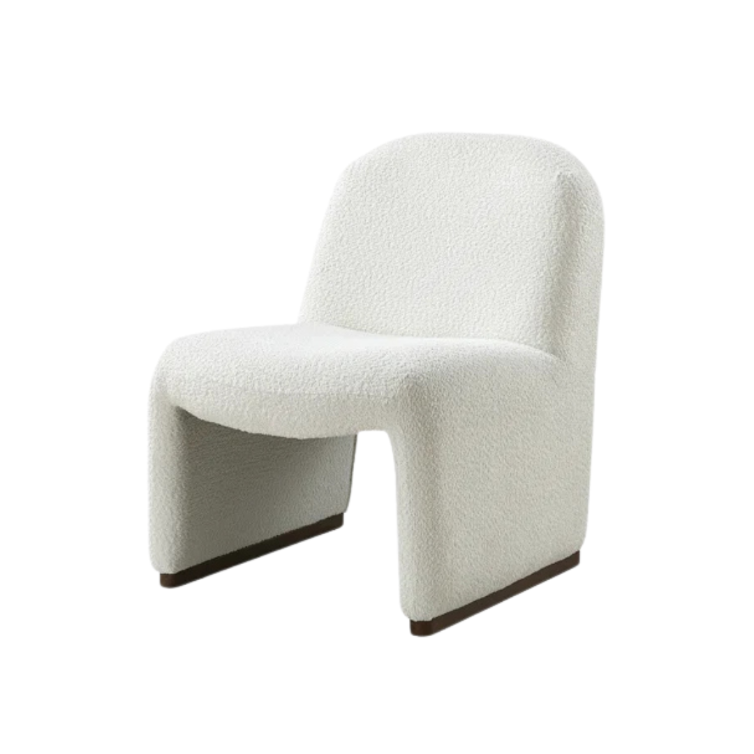 white boucle funky accent chair with bold curved frame, white background and angled view.