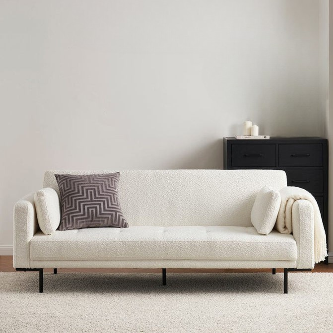this image shows a modern boucle sofa bed set in a modern living room.