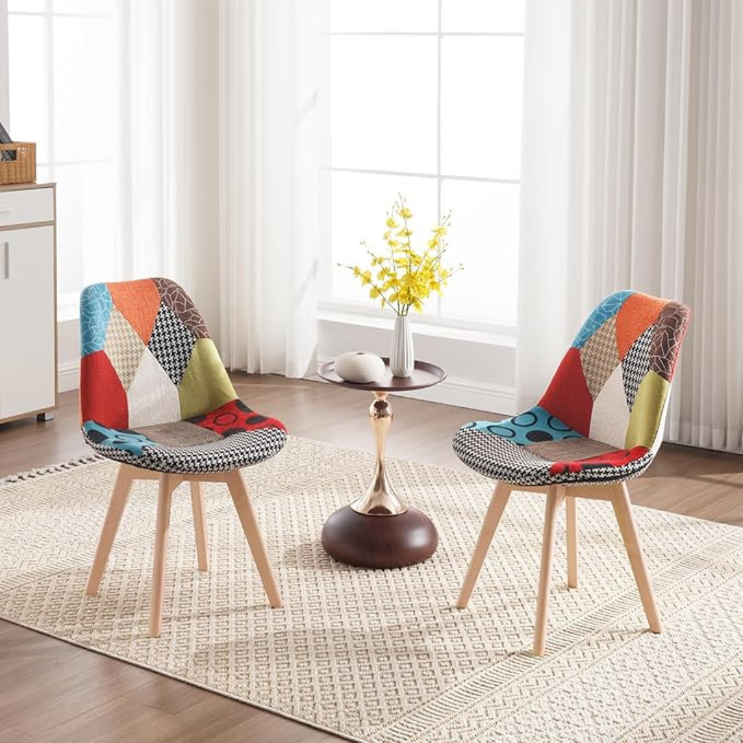 image shows two of our funky patchwork dining chairs set in a modern home.