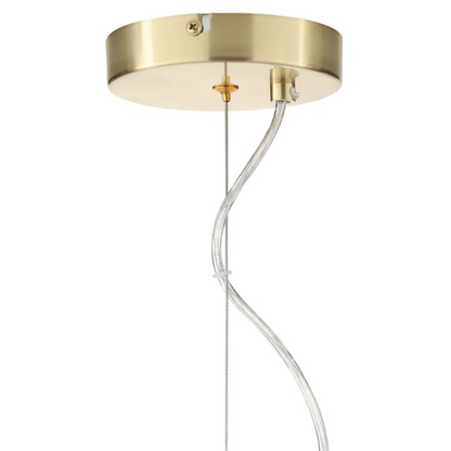 Gold pendant light fixture with clear cable on a white background
