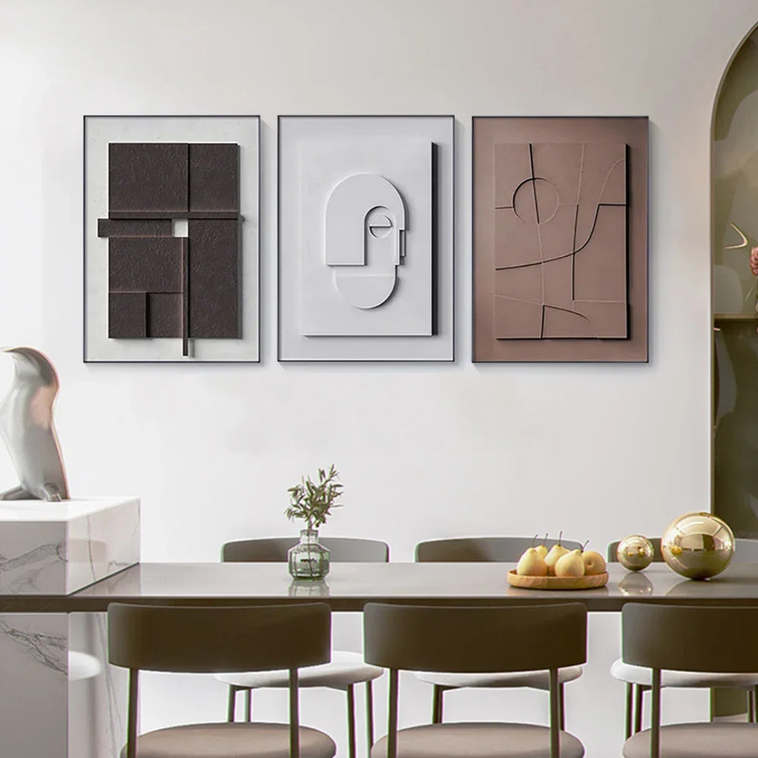 Dining room with abstract art on the wall and a marble table.
