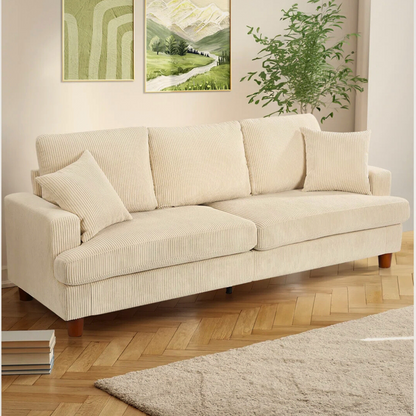 3-Seater Beige Corduroy Fabric Sofa, set in a model home.