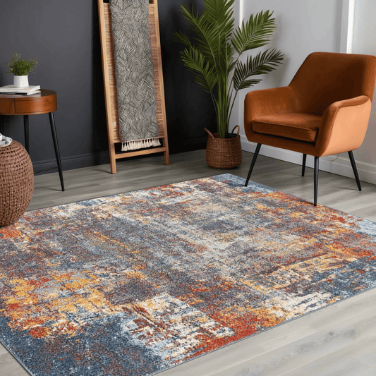 Multicolored area rug in a room with a brown chair, plant, and wooden side table.