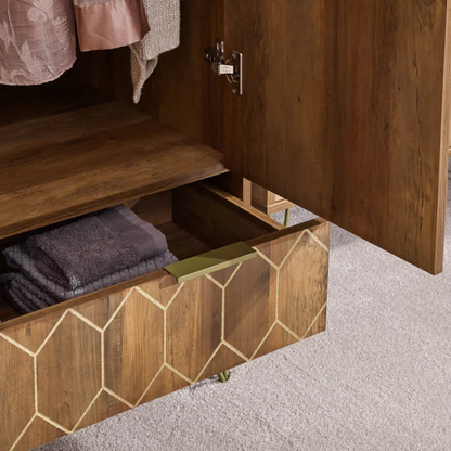 Wooden cabinet with geometric patterned drawer open, revealing folded towels inside.