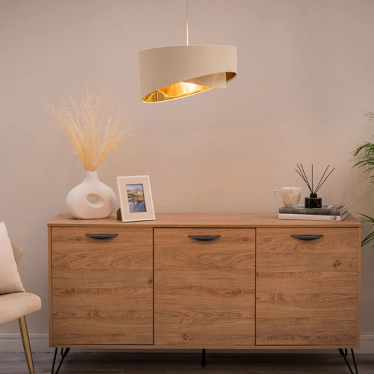 Wooden sideboard with decorative items in a room setting