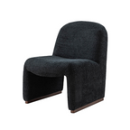 black boucle funky accent chair with curved design, angled view, white background.