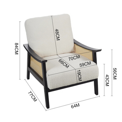 black indoor rattan armchair with curved open weave design, dimensions.