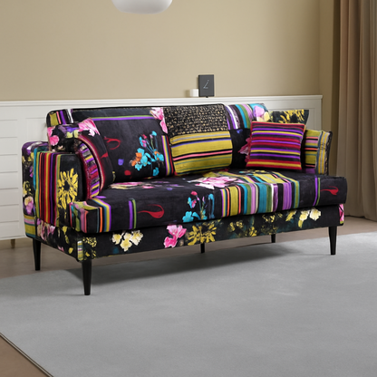 Black Multi Coloured Three Seater Patchwork Sofa, set in a model home.