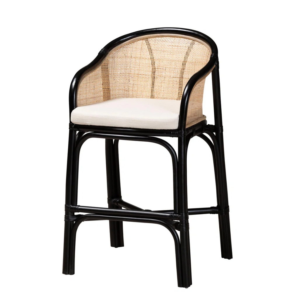 Chair with black frame, woven backrest, and white cushion on a white background