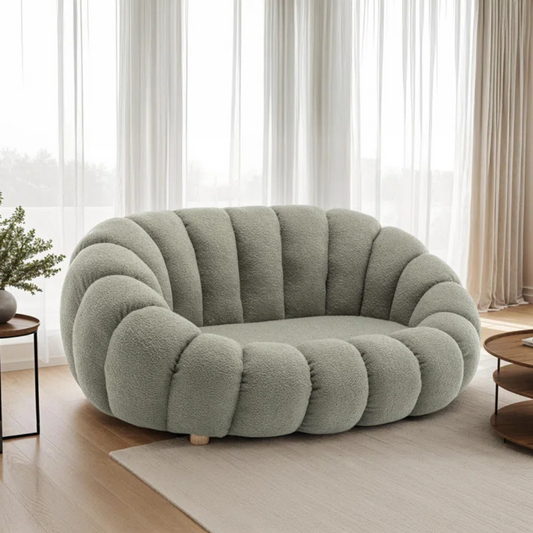 Boucle Sage Light Green Sofa, set in a modern home.