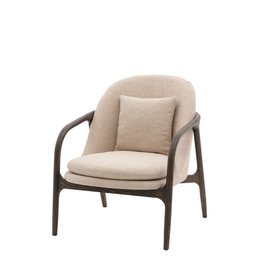 Beige armchair with brown frame on a white background