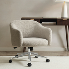 Beige textured office chair in a room with a desk and lamp.